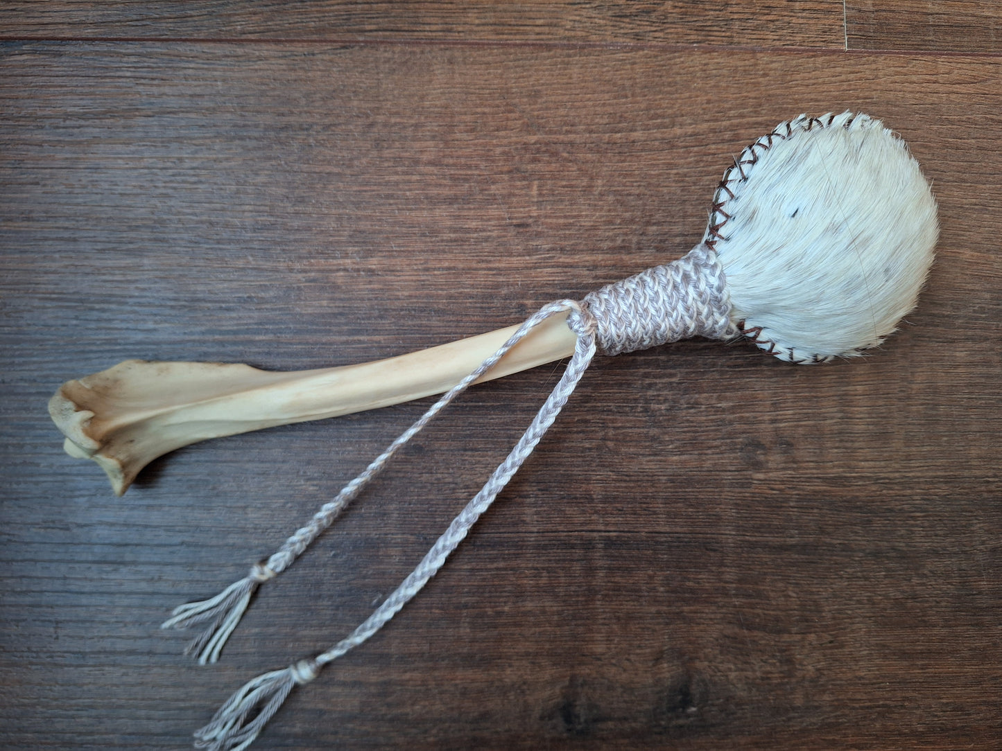 Horse hide and red deer leg bone rattle