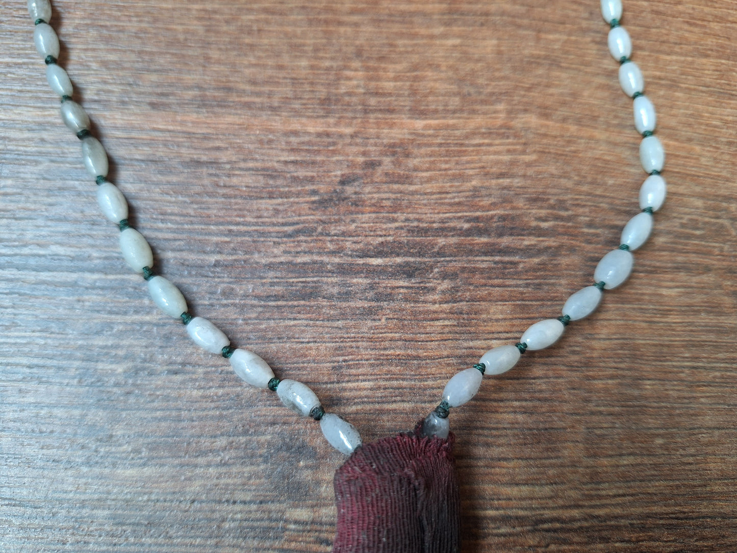 Vintage Nepalese snow quartz necklace with wild boar tooth pendant