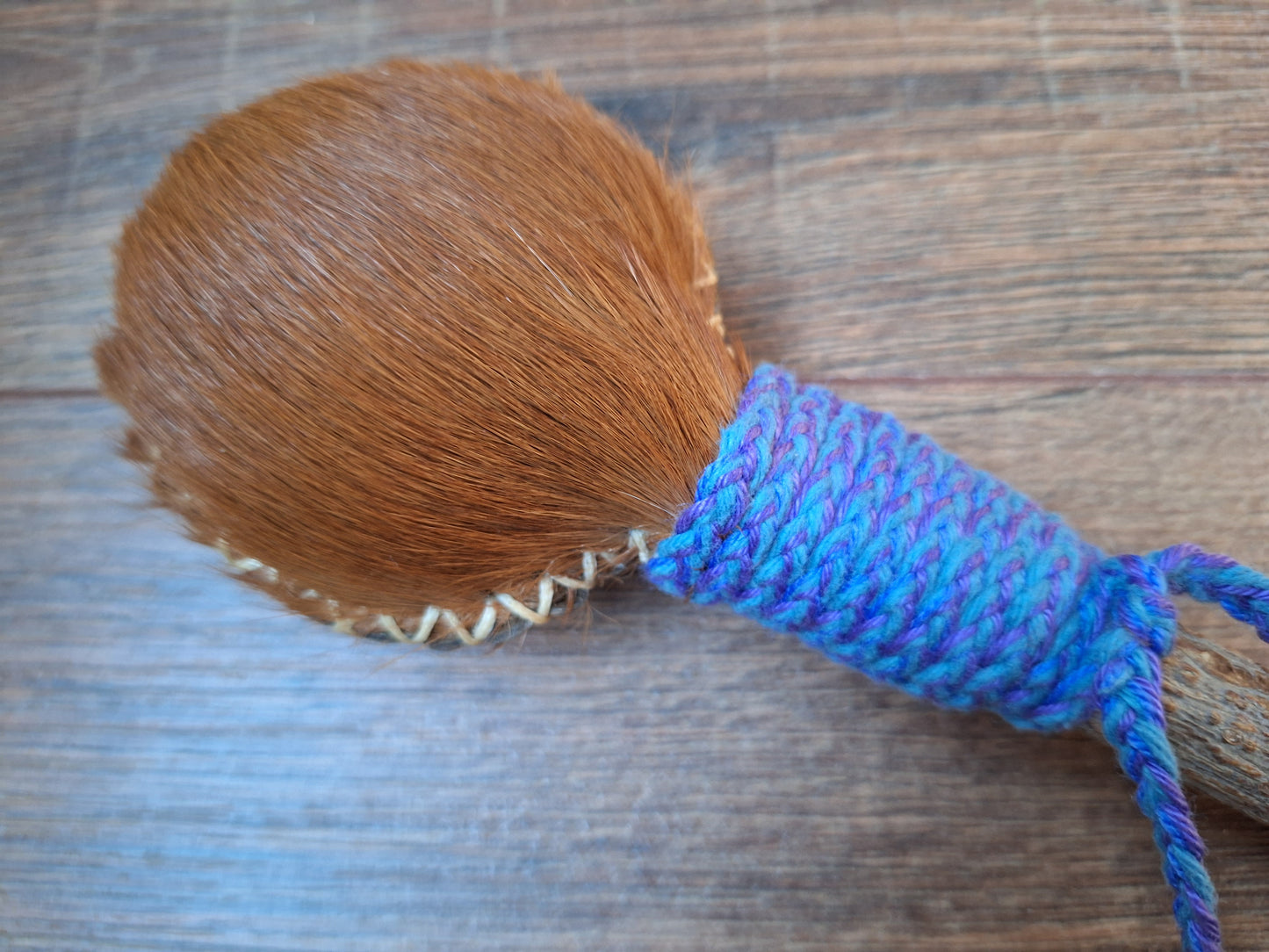 Horse hide and elder wood rattle
