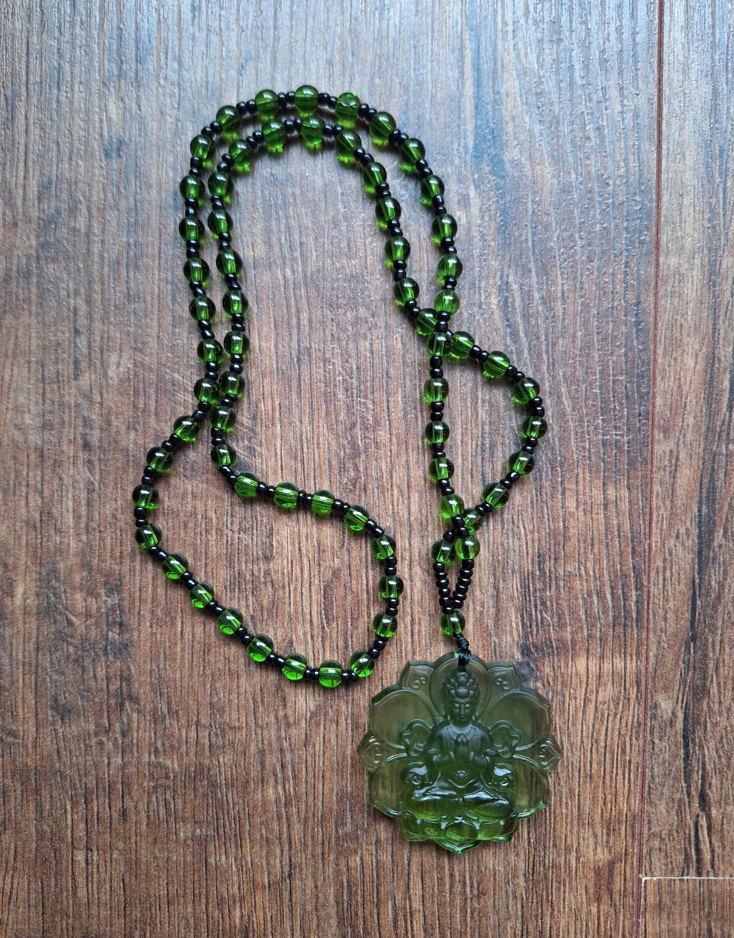 Green glass necklace with Green Tara pendant