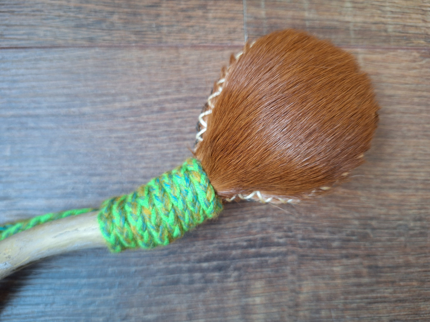 Horse hide and driftwood rattle
