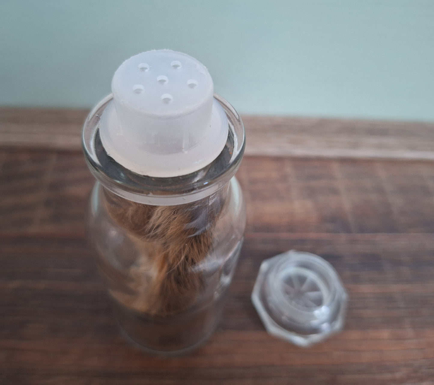 Hare paws, B-quality, in glass bottle