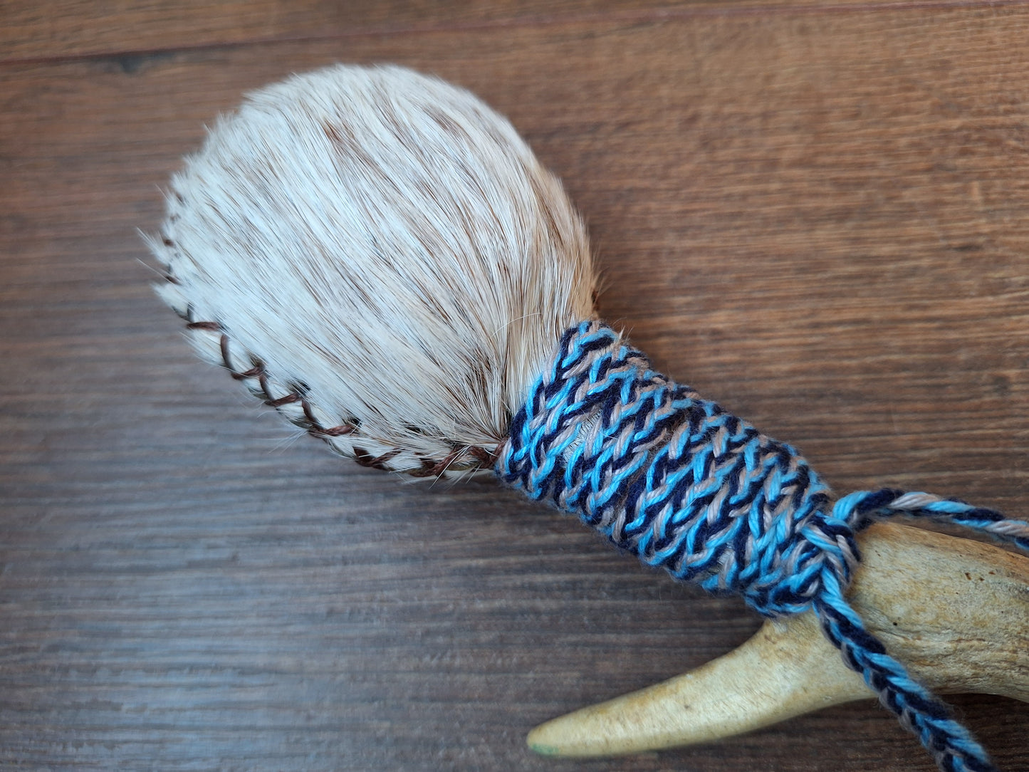 Horse hide and roe deer antler rattle