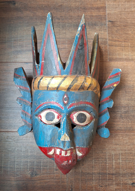 Vintage wooden Kali mask
