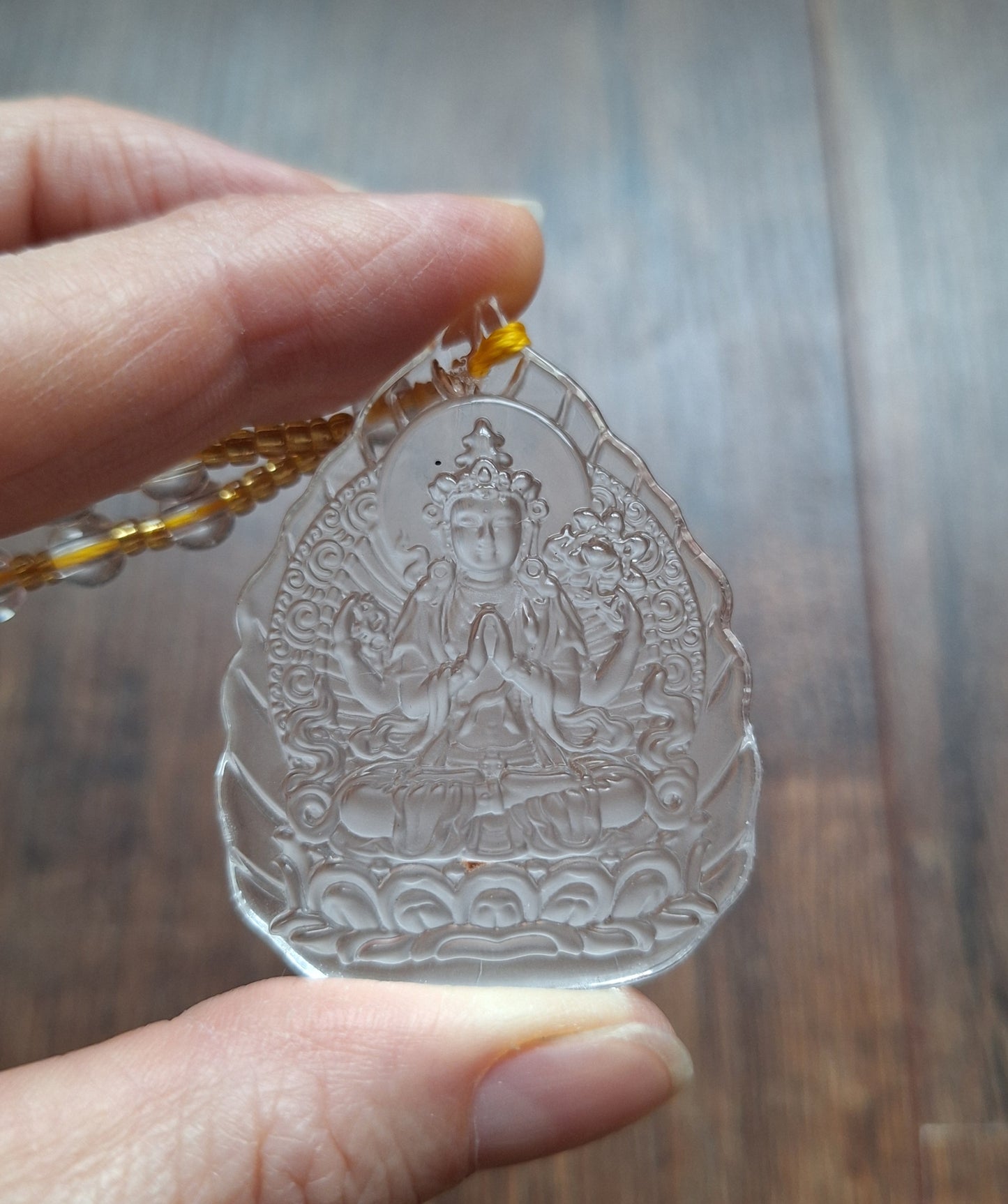 Glass necklace with Guanyin pendant