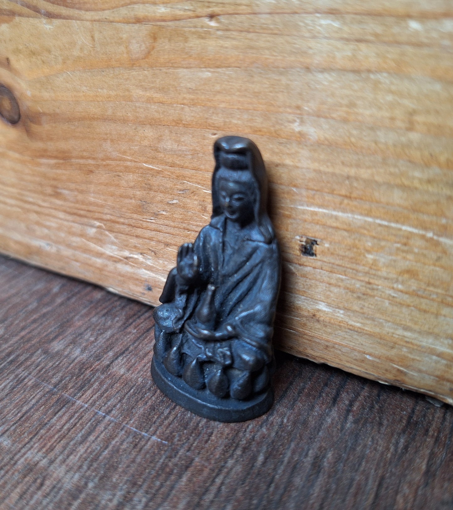 Small bronze Guanyin figurine