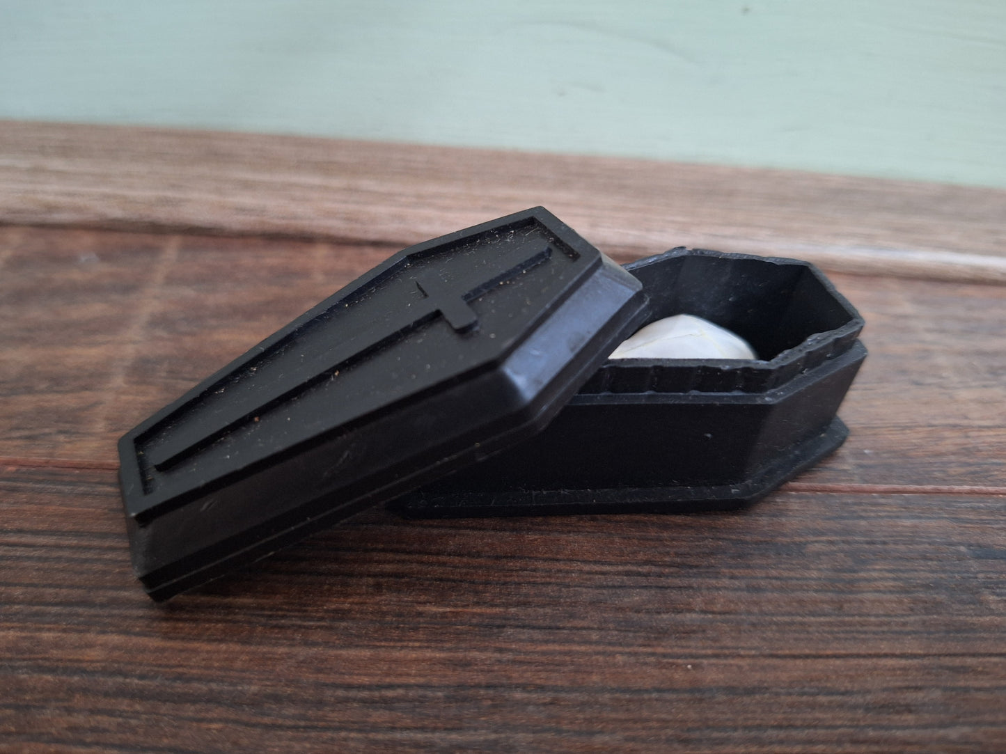 Mole skull in coffin