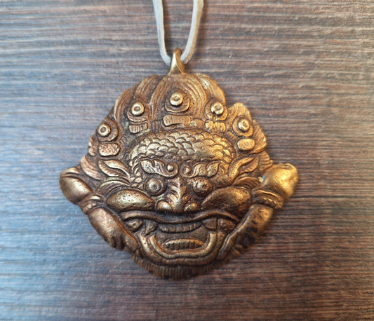 Vintage brass Cheppu pendant