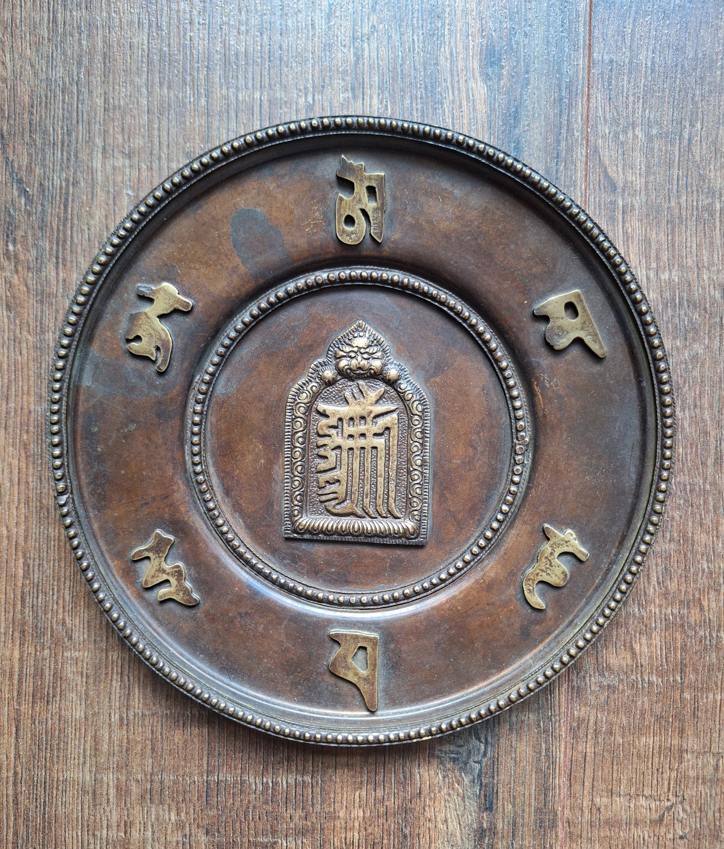 Red copper wallhanger Kalachakra