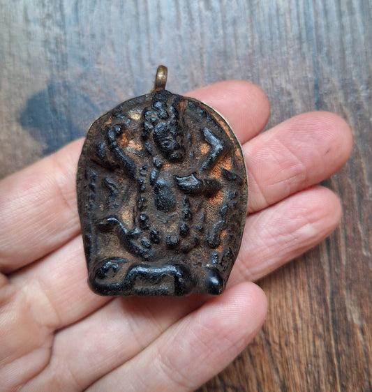 Vintage Nepalese glass pendant Mahakala