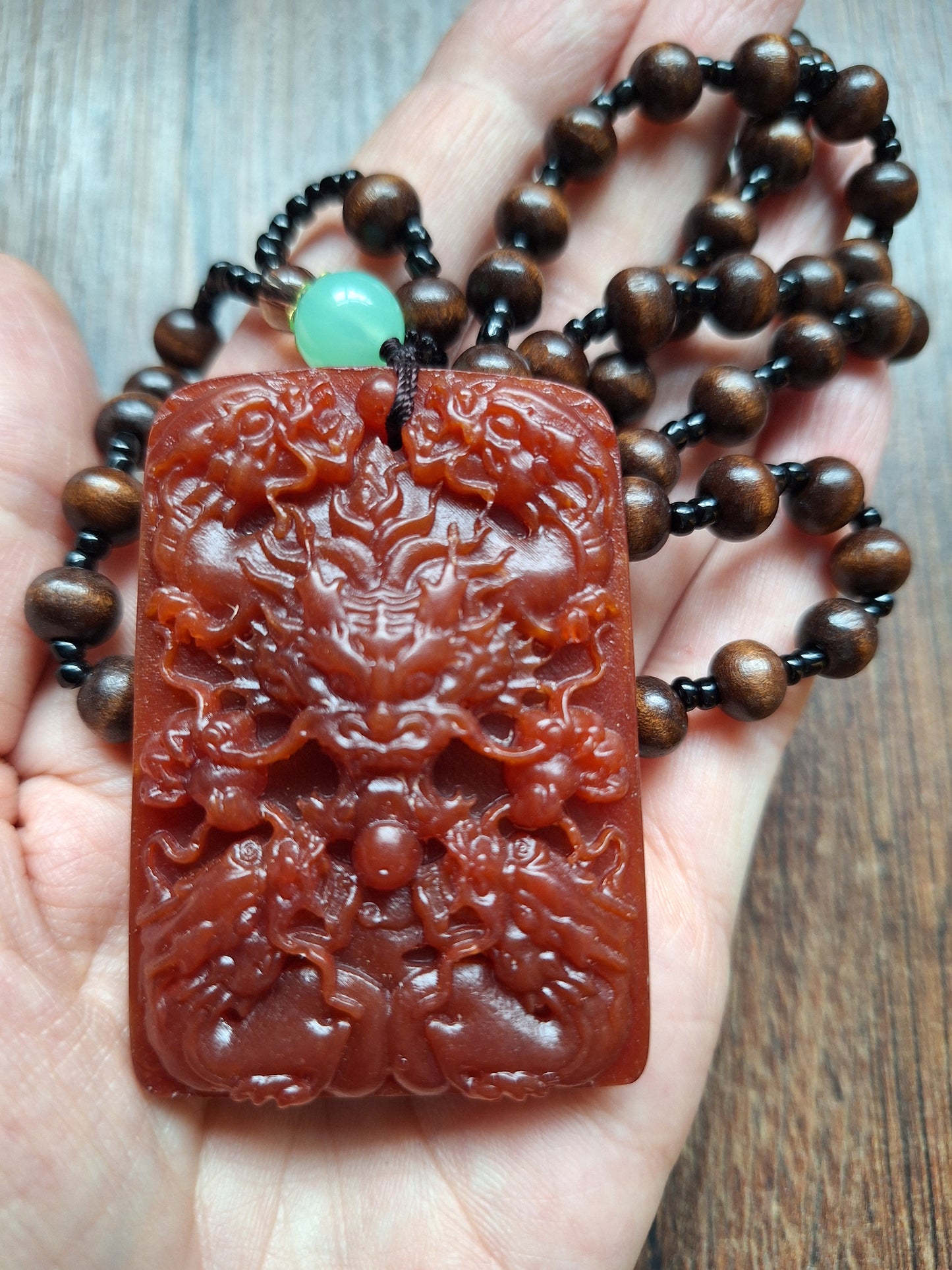 Necklace with resin dragon pendant