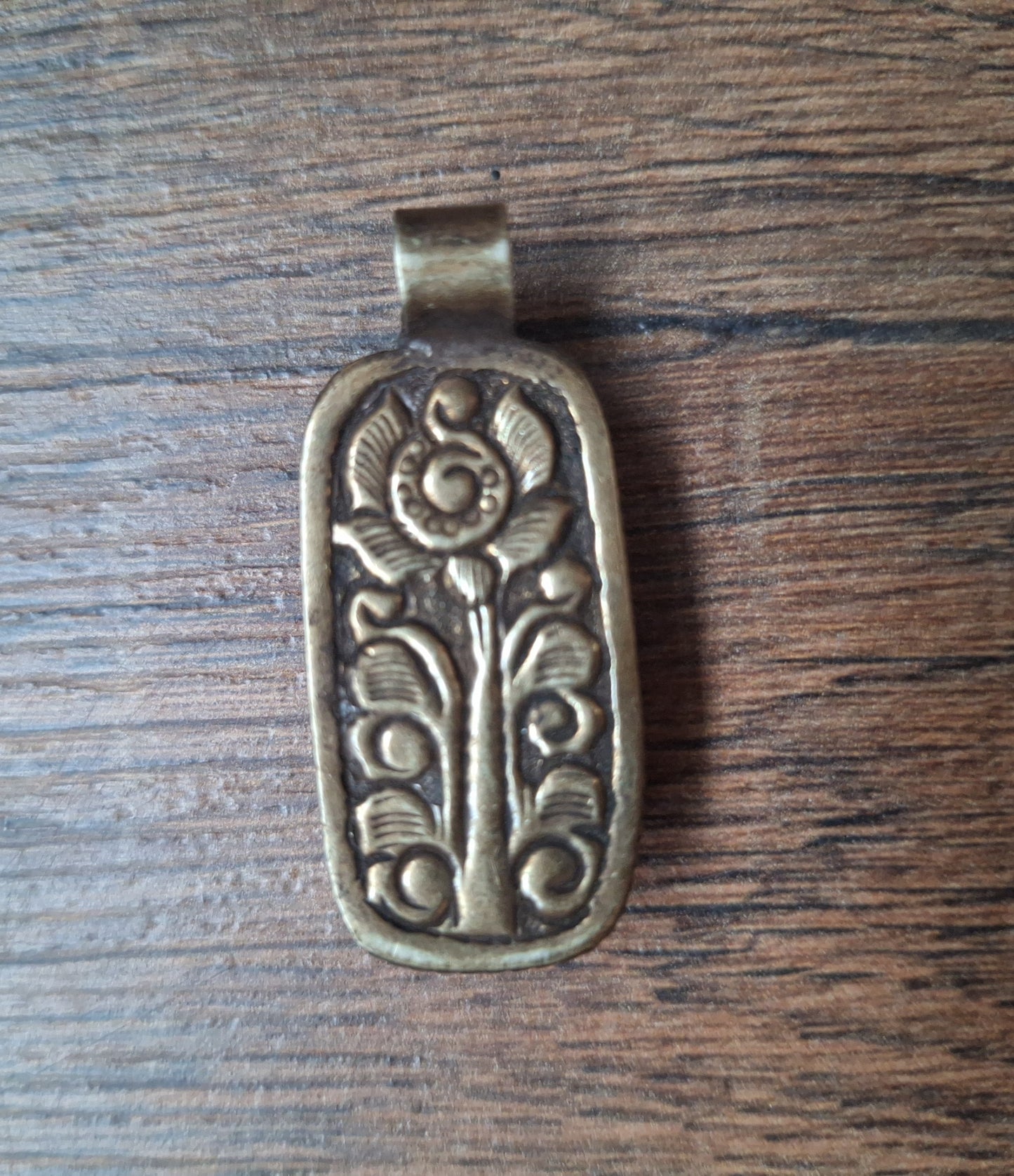 Vintage Tibetan silver and amber pendant
