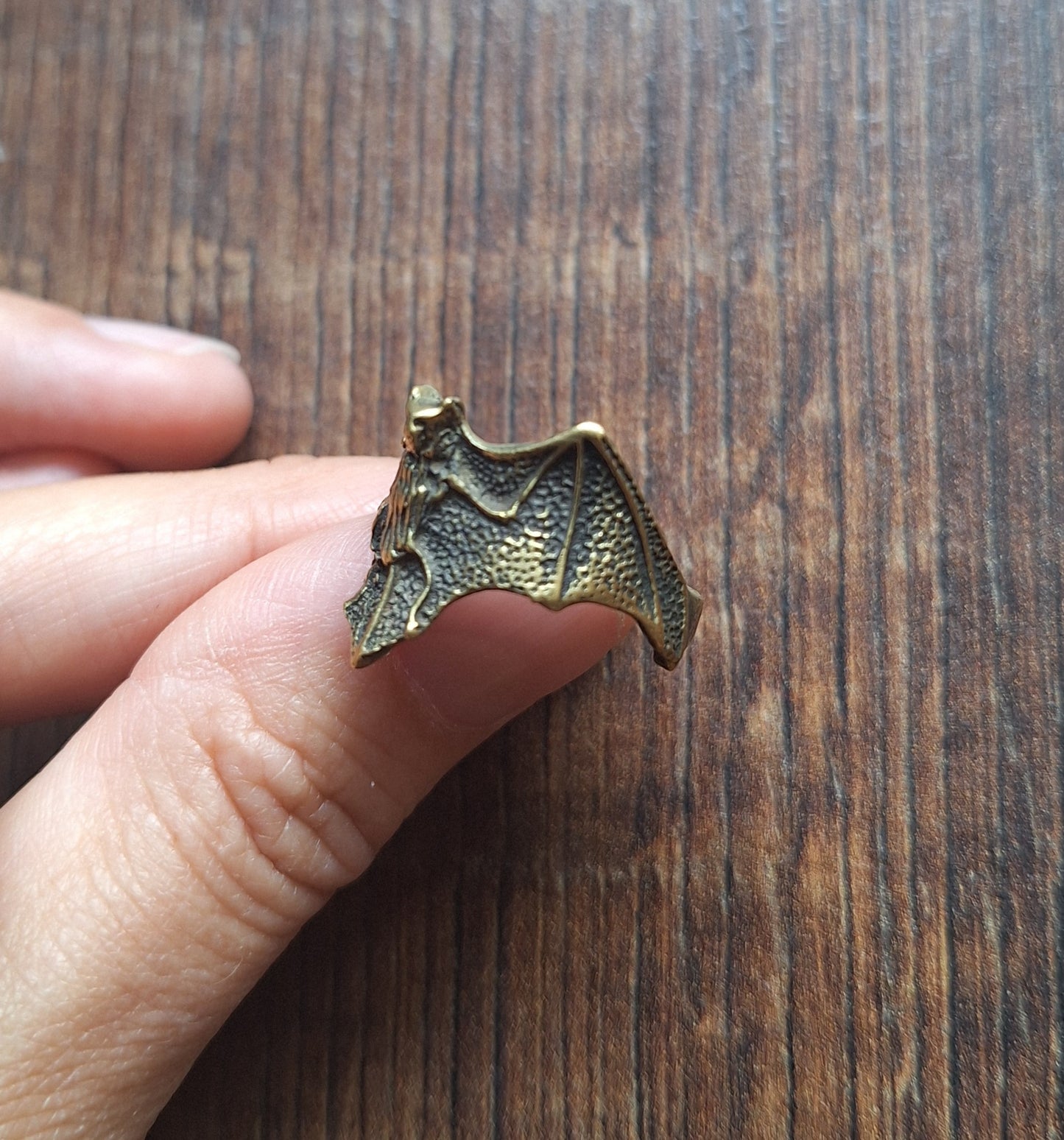 Brass ring Bat
