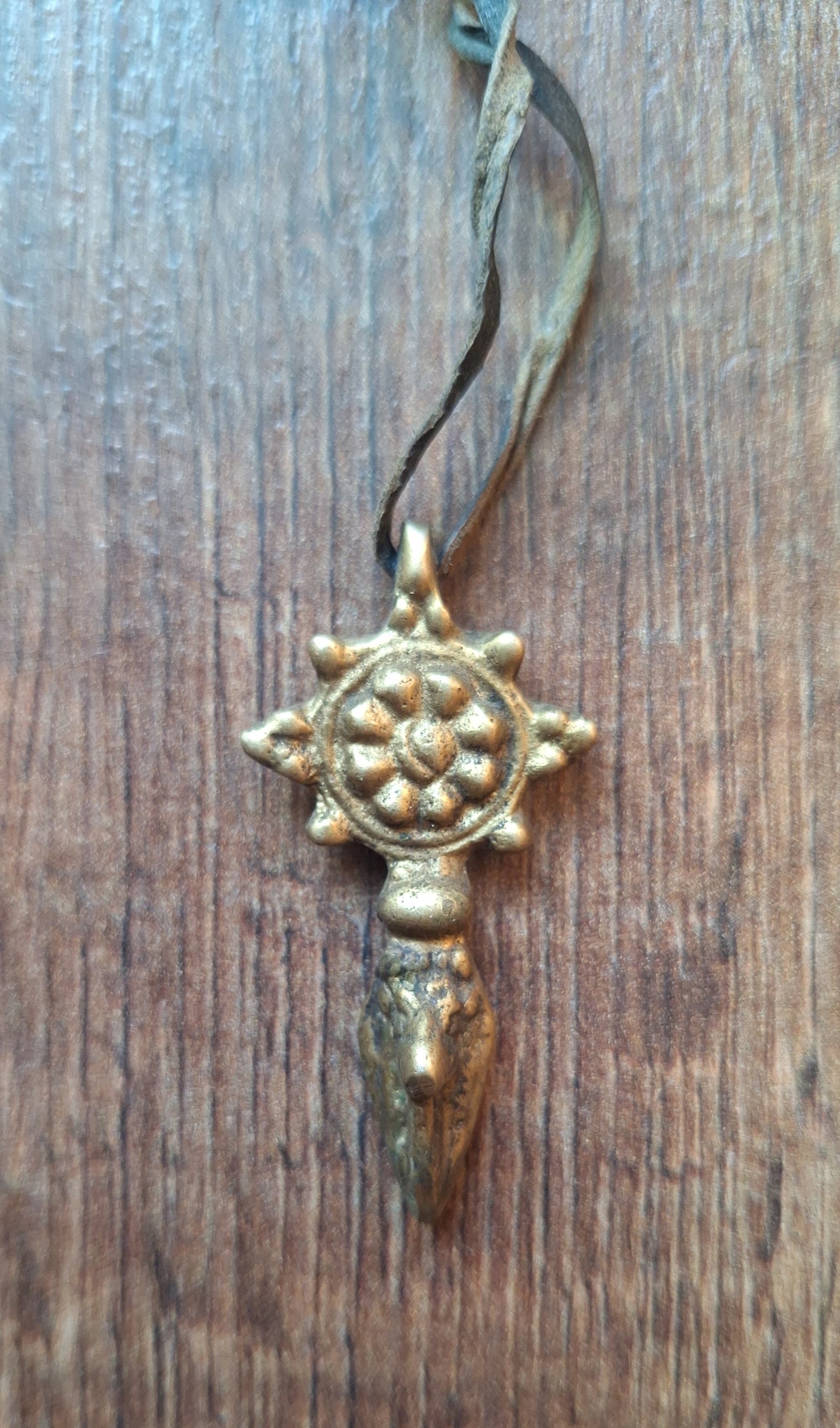 Vintage brass phurba pendant Dharma Wheel