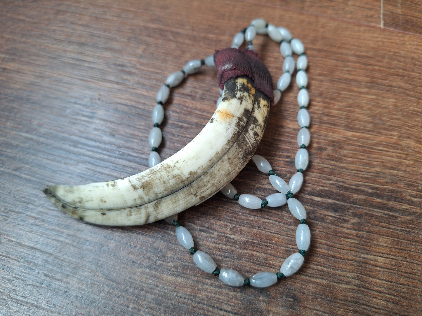 Vintage Nepalese snow quartz necklace with wild boar tooth pendant