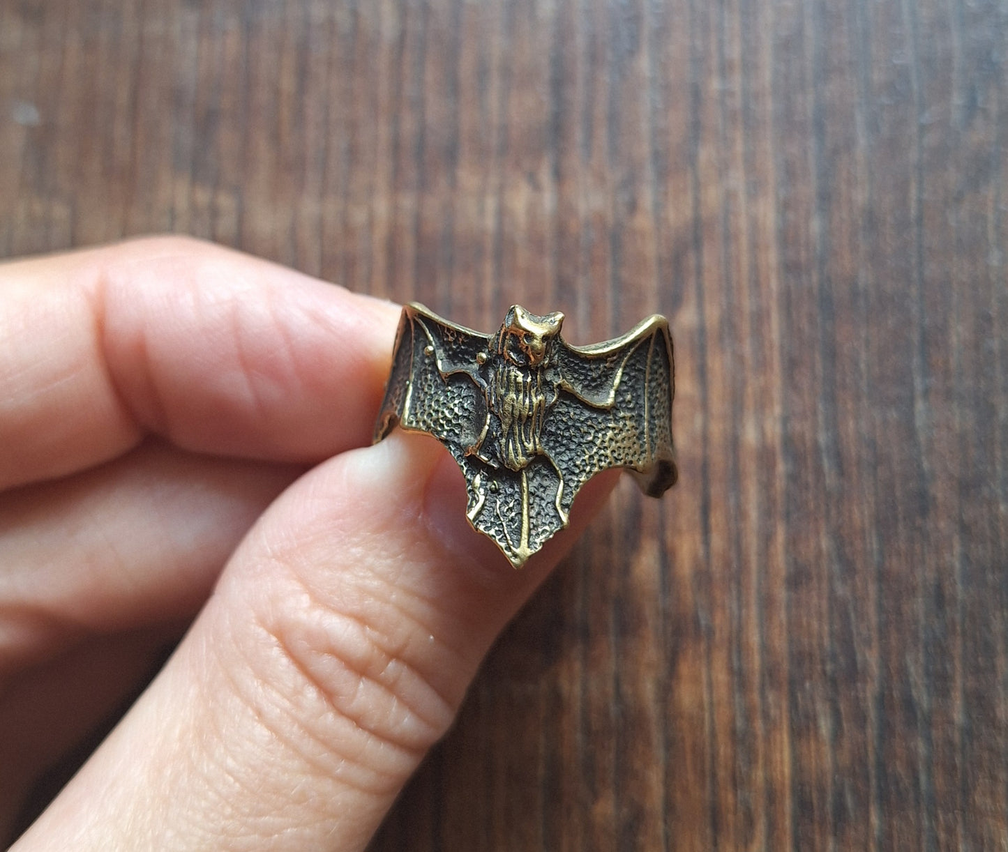 Brass ring Bat