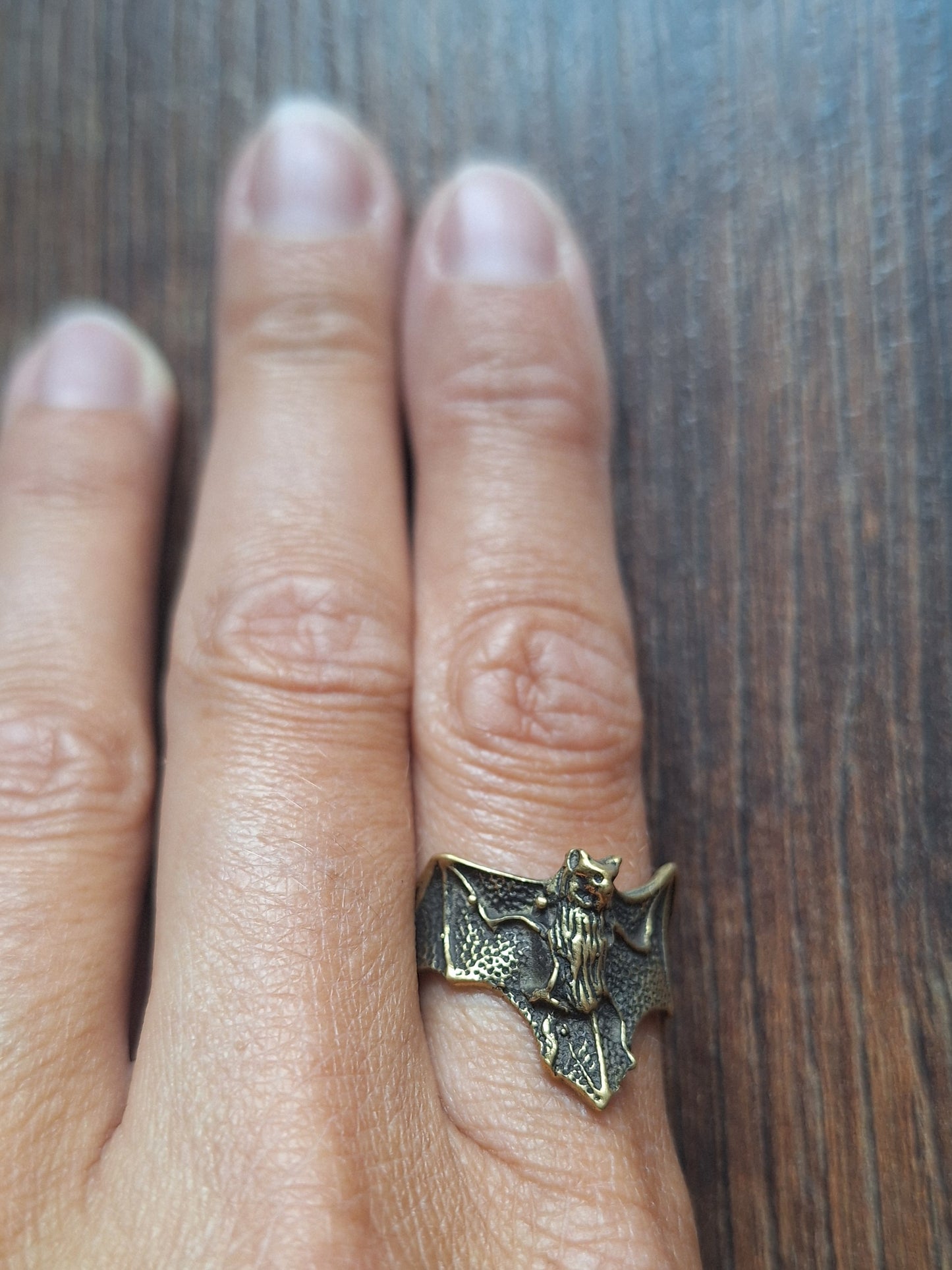 Brass ring Bat