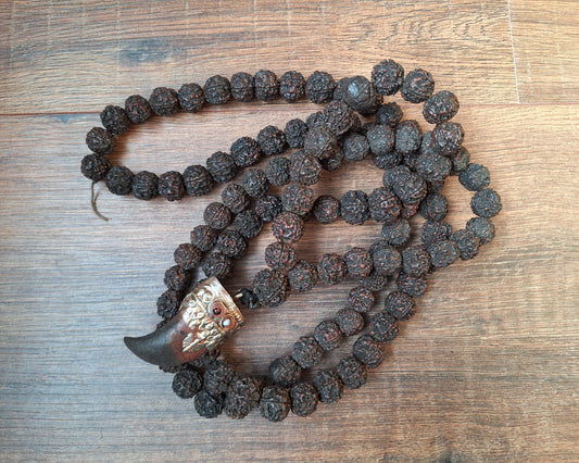 Vintage Nepalese rudraksha mala with horn pendant