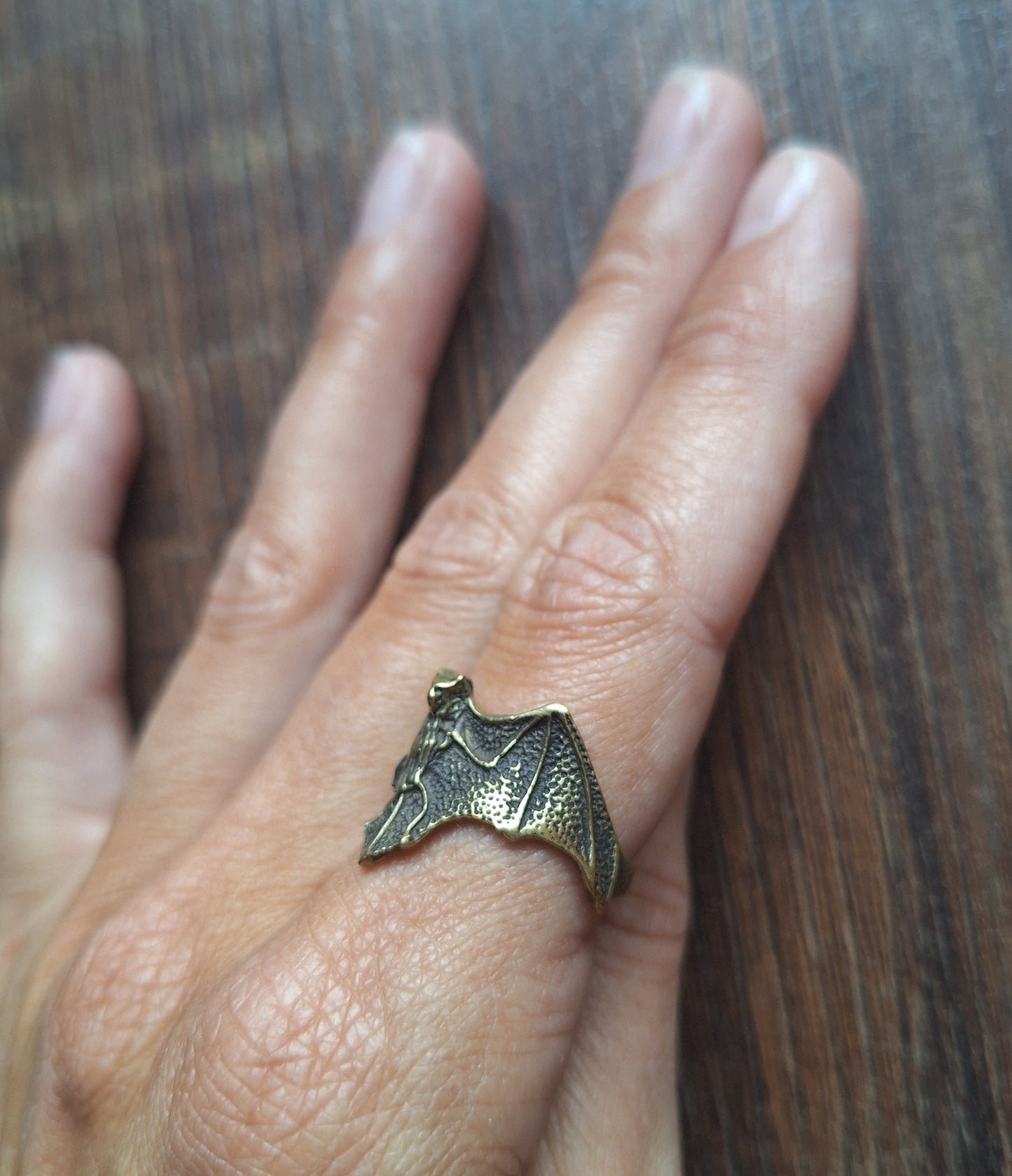 Brass ring Bat
