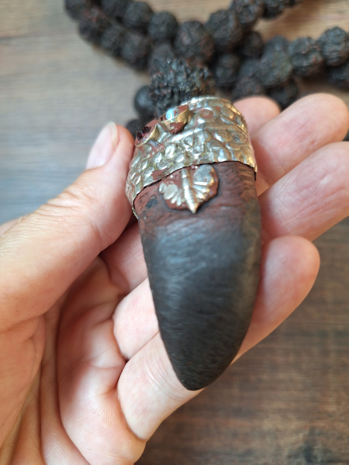 Vintage Nepalese rudraksha mala with horn pendant