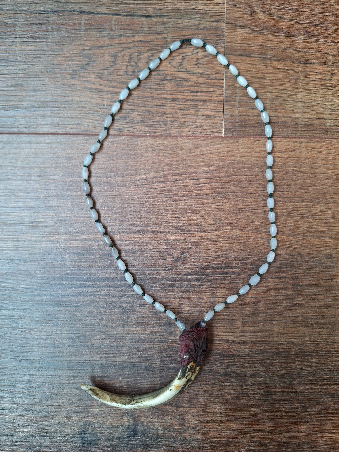 Vintage Nepalese snow quartz necklace with wild boar tooth pendant