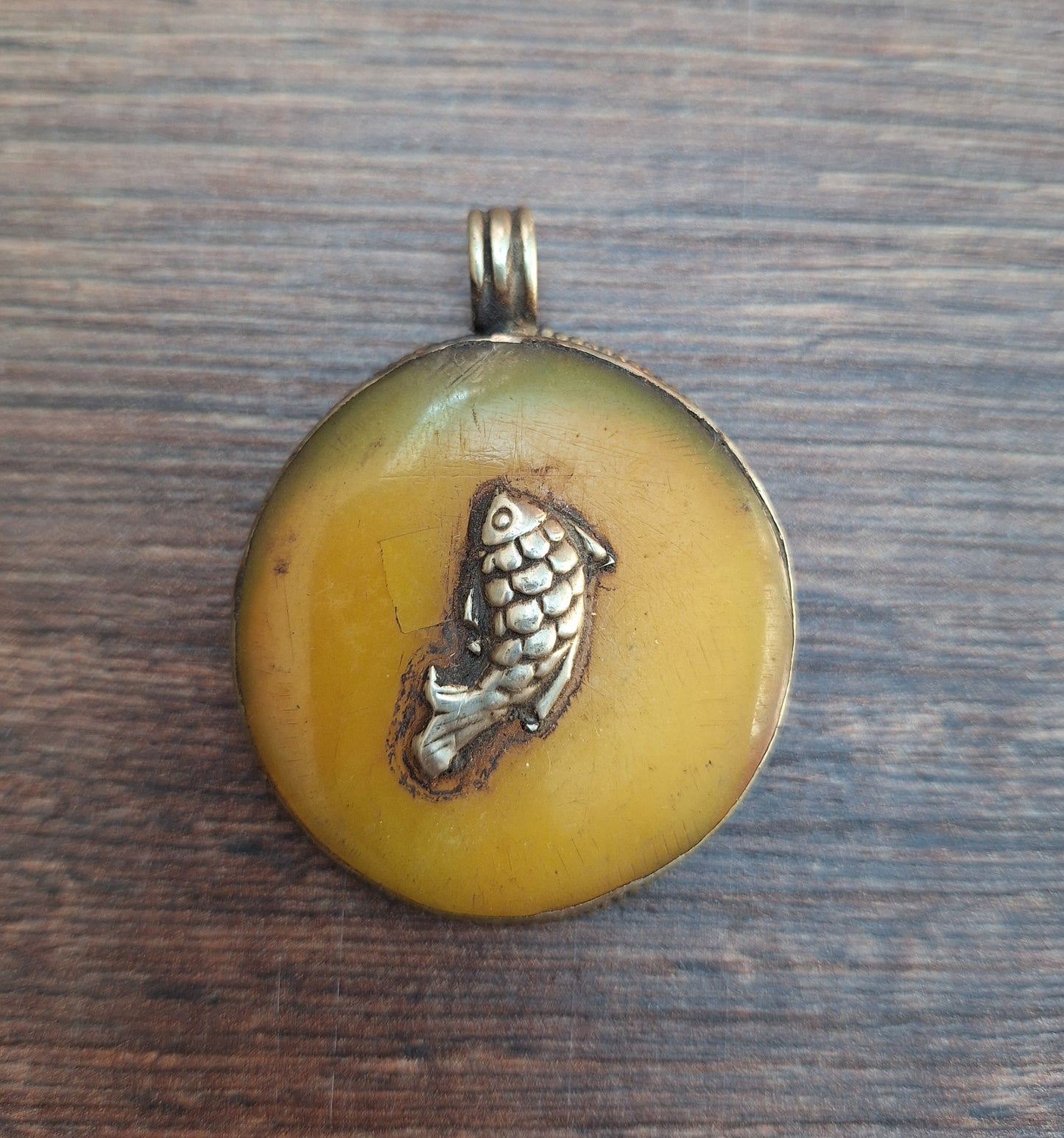 Vintage Tibetan silver and copal pendant