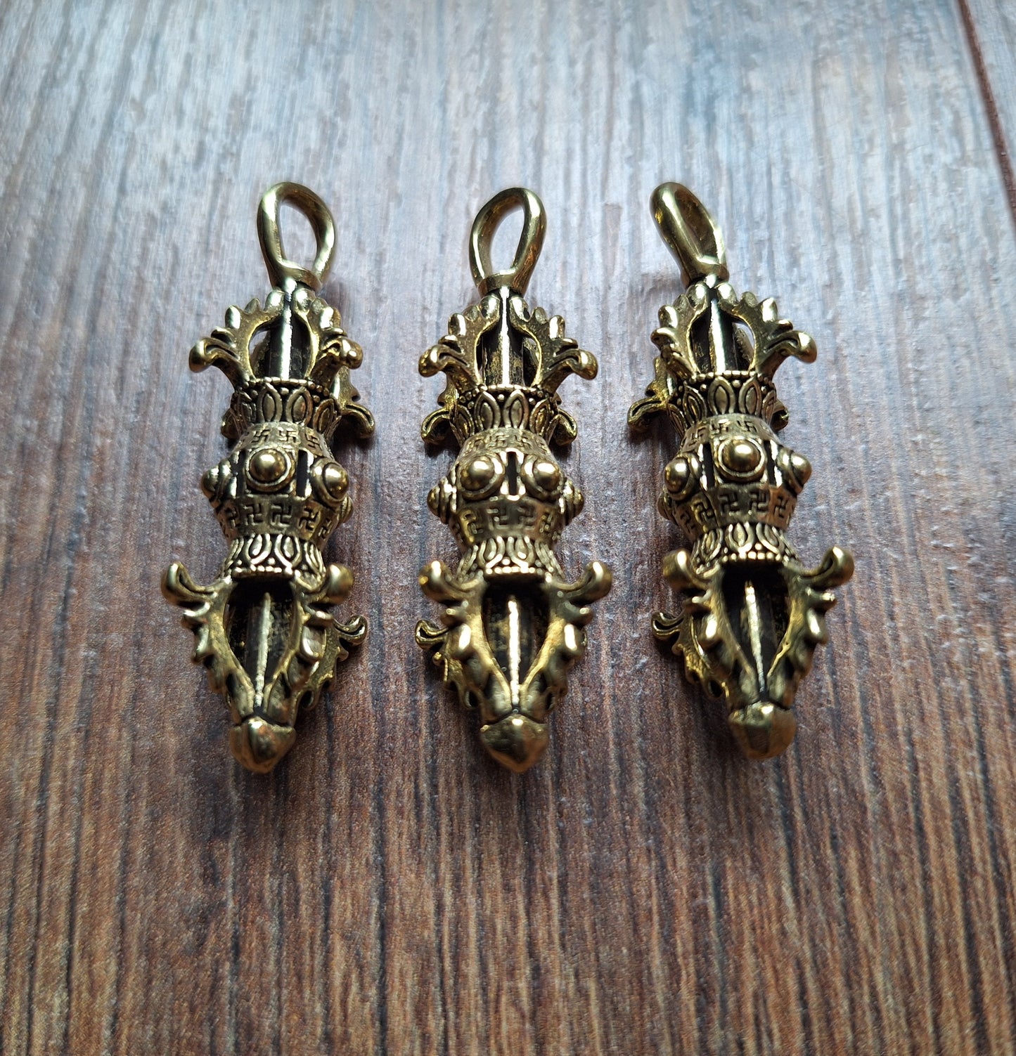 Brass dorje pendant