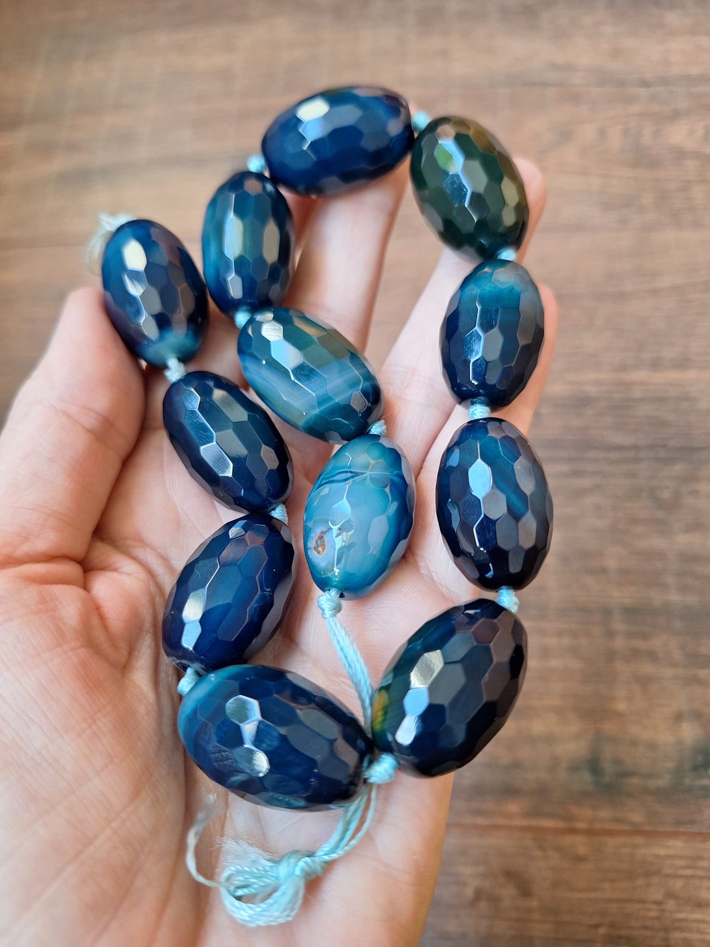 Faceted blue agate bead strand