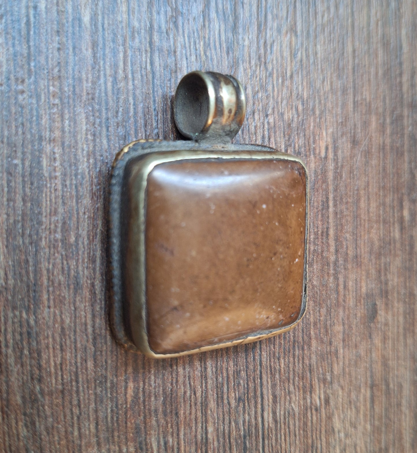 Vintage Tibetan silver and stone pendant