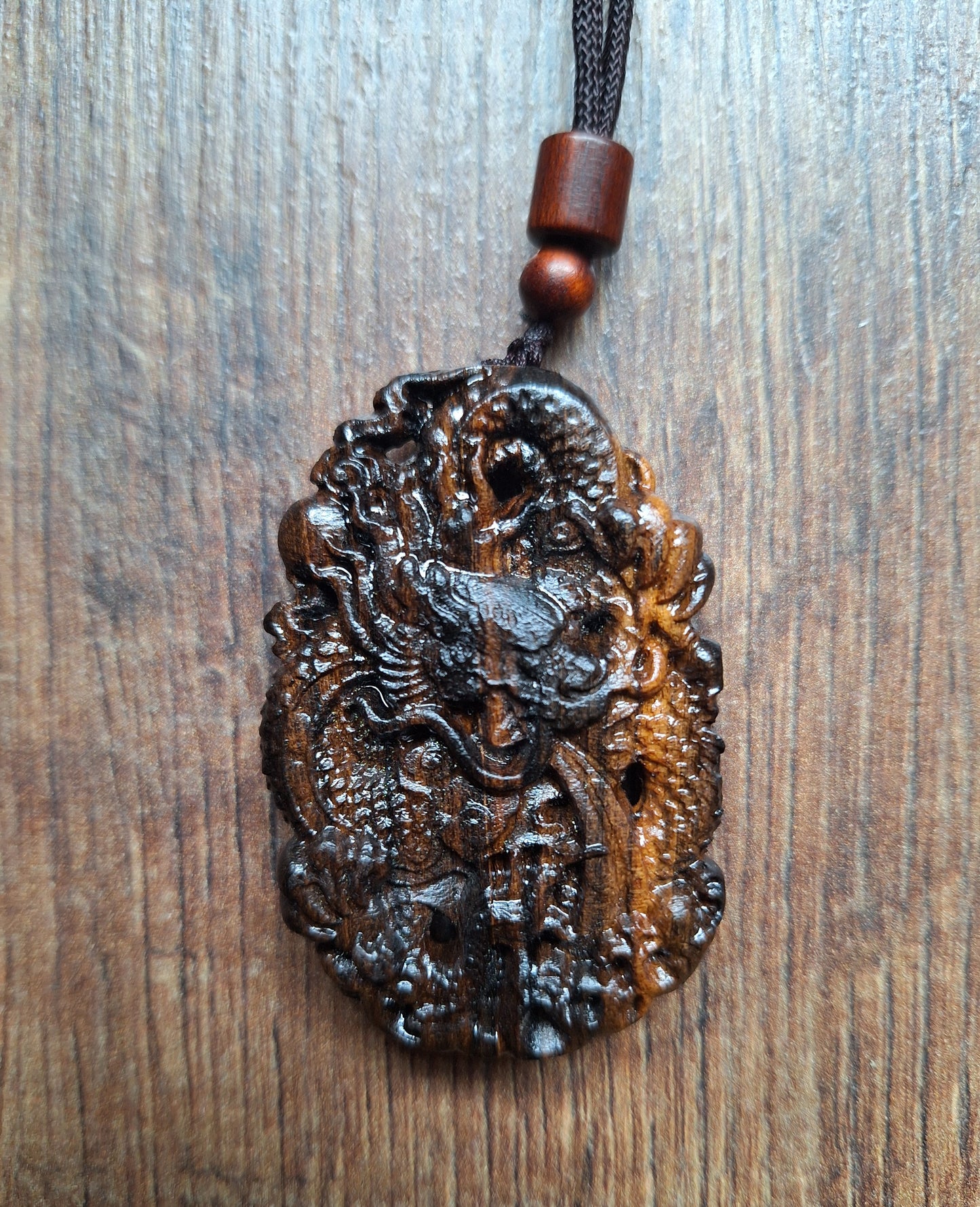 Necklace with wooden pendant Dragon