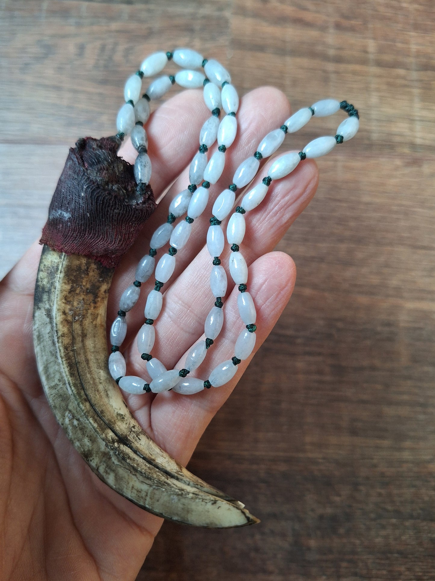 Vintage Nepalese snow quartz necklace with wild boar tooth pendant