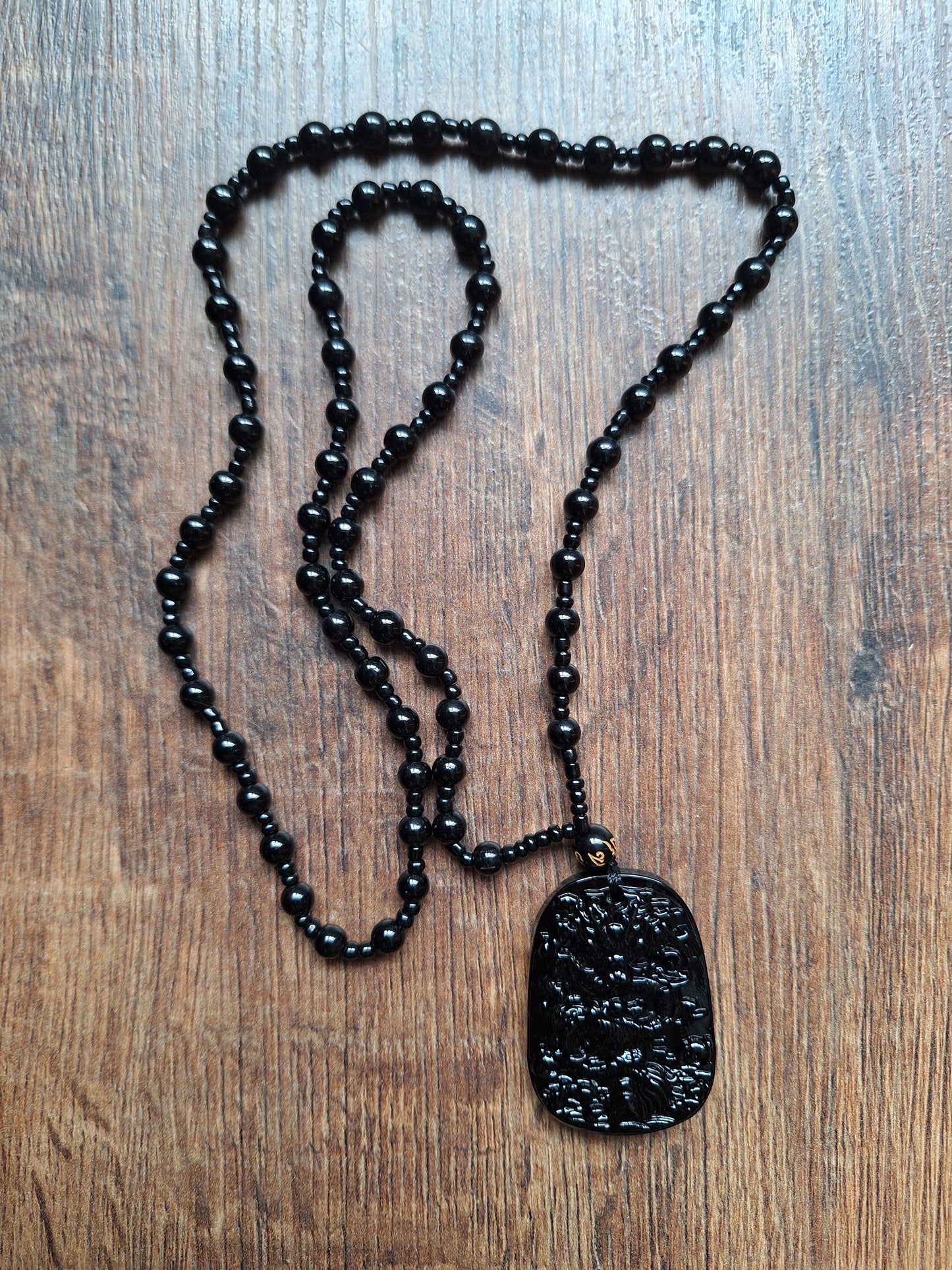 Black glass necklace with Dragon pendant