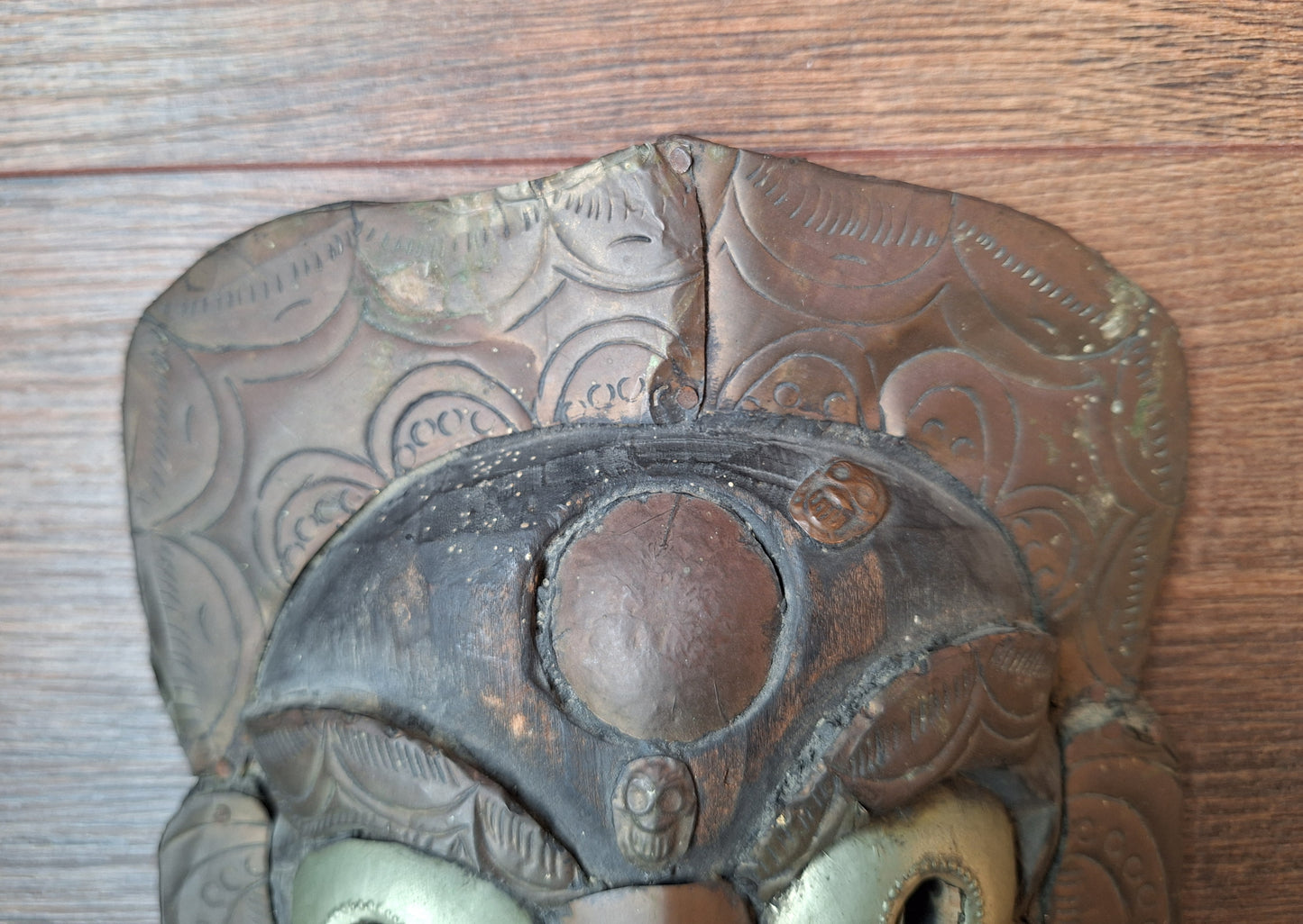 Old wooden Mahakala mask with metal plating