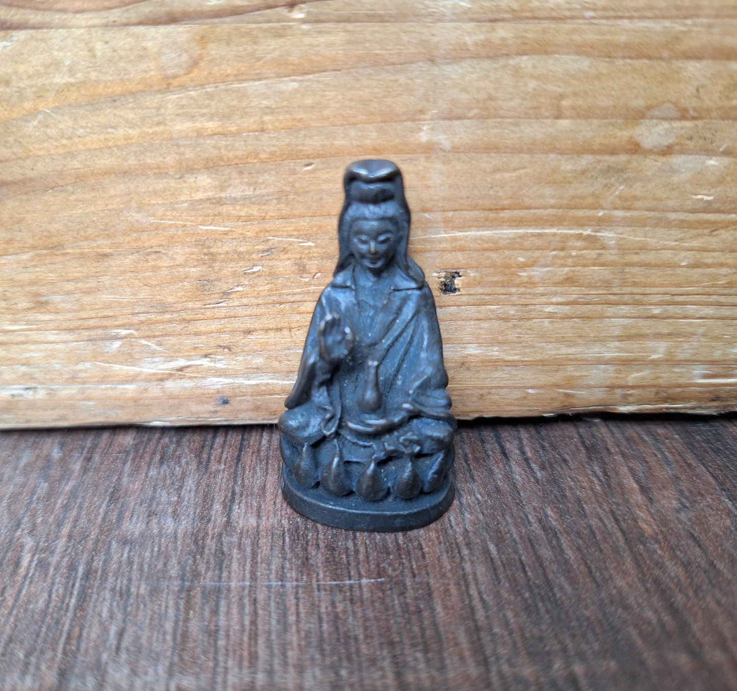 Small bronze Guanyin figurine