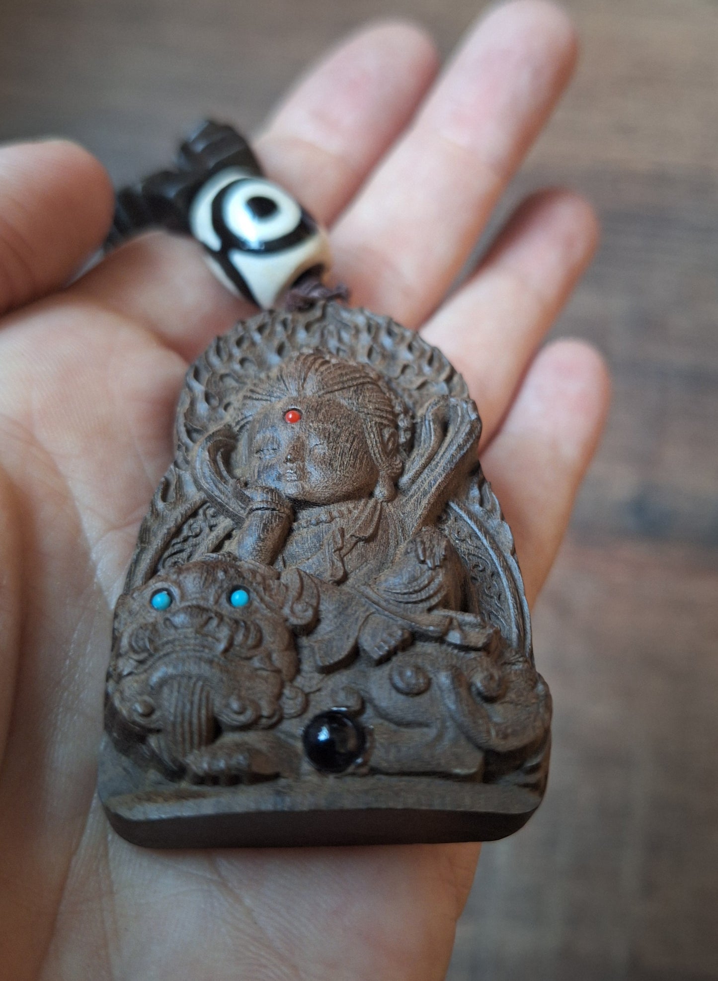 Wooden mala with Guanyin pendant