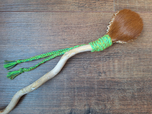 Horse hide and driftwood rattle