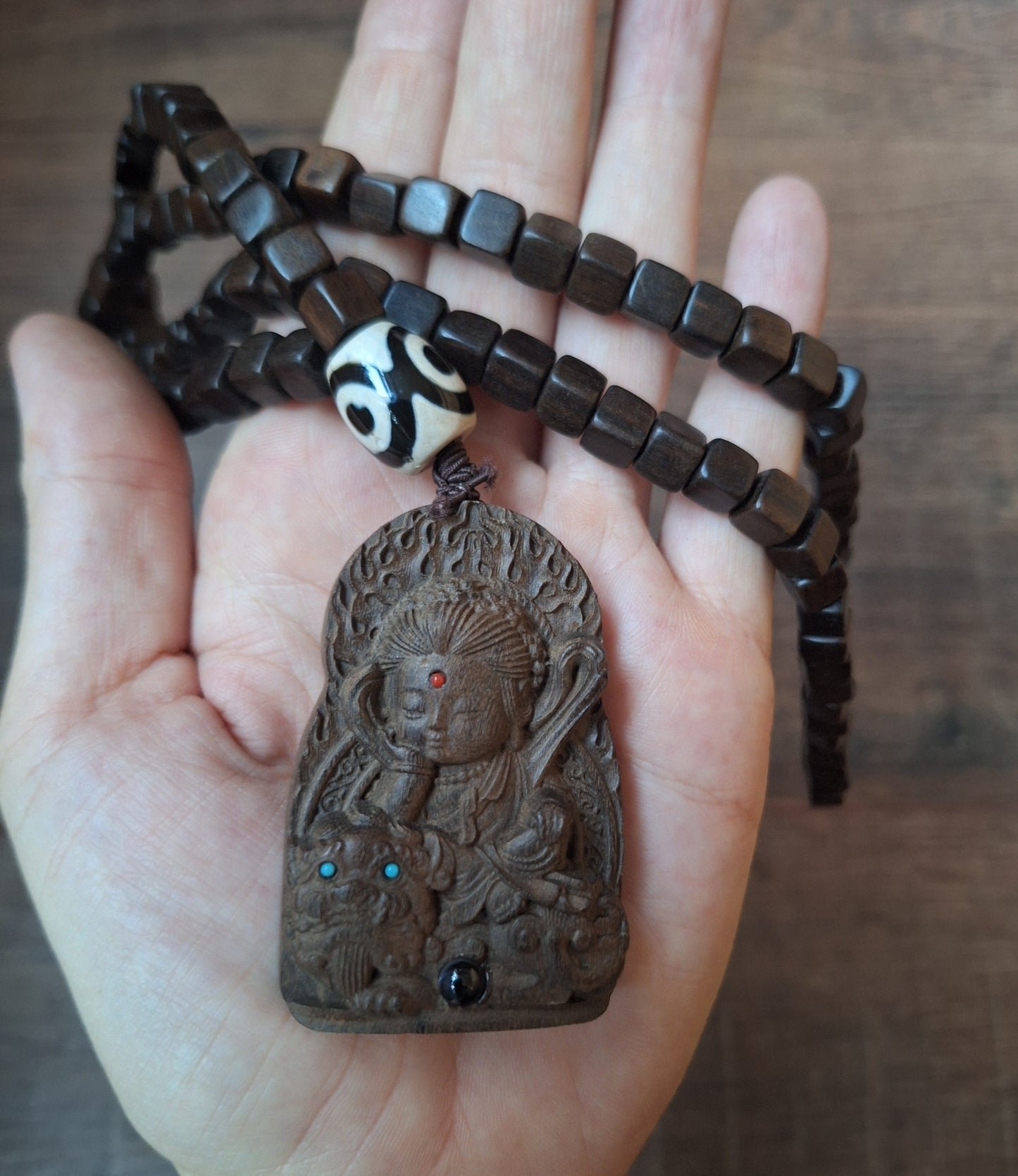 Wooden mala with Guanyin pendant