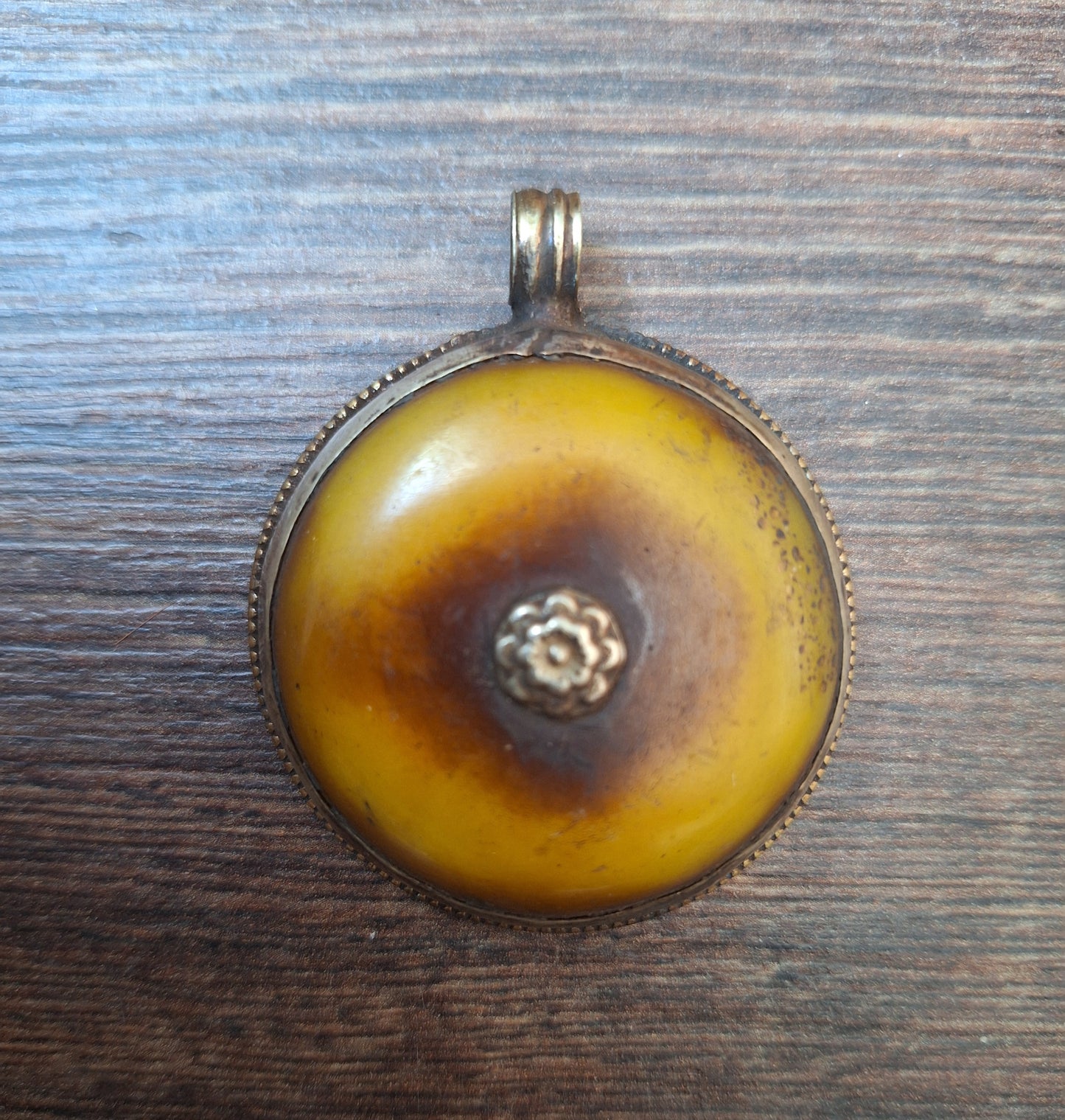Vintage Tibetan silver and copal pendant