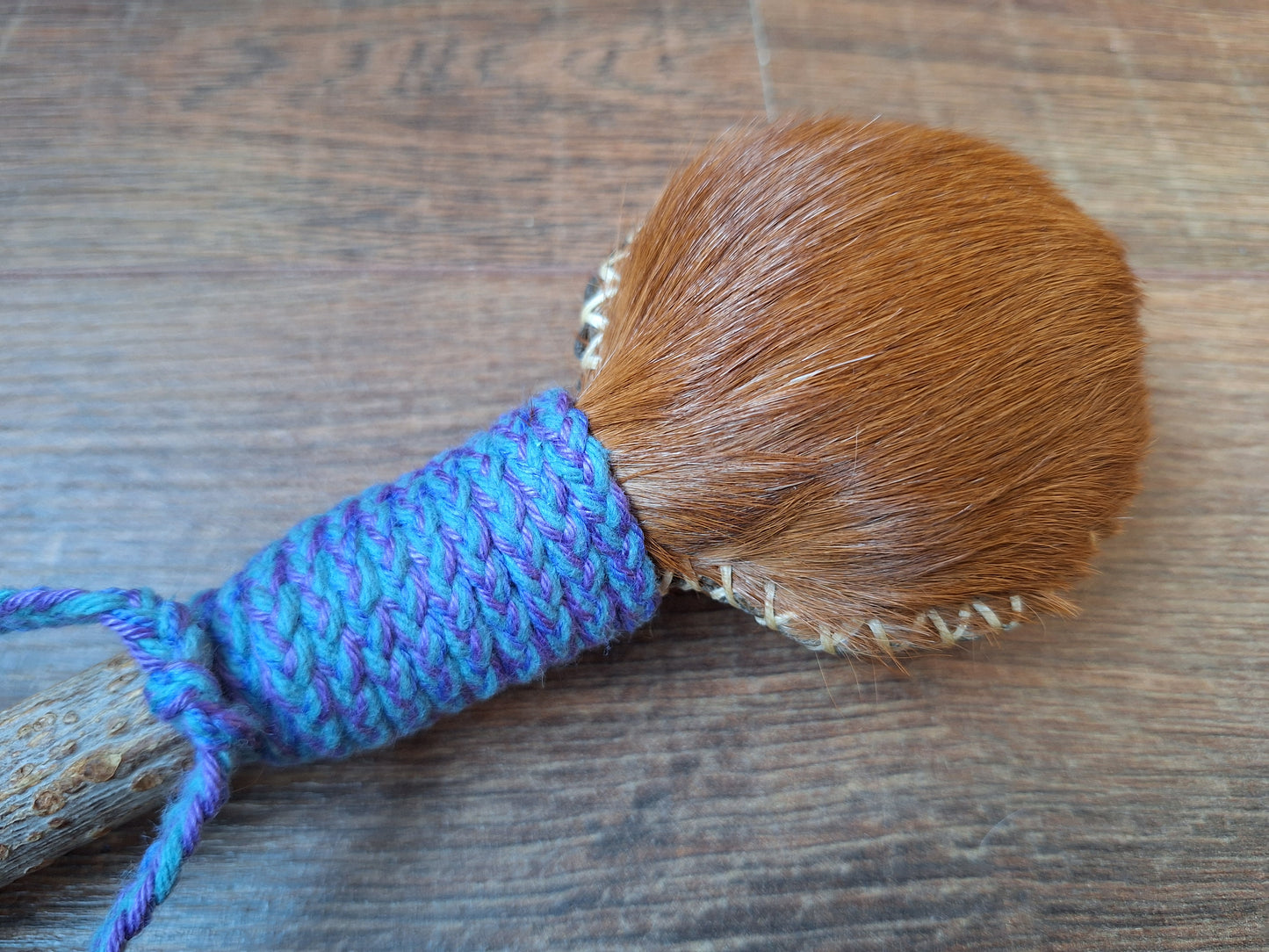 Horse hide and elder wood rattle