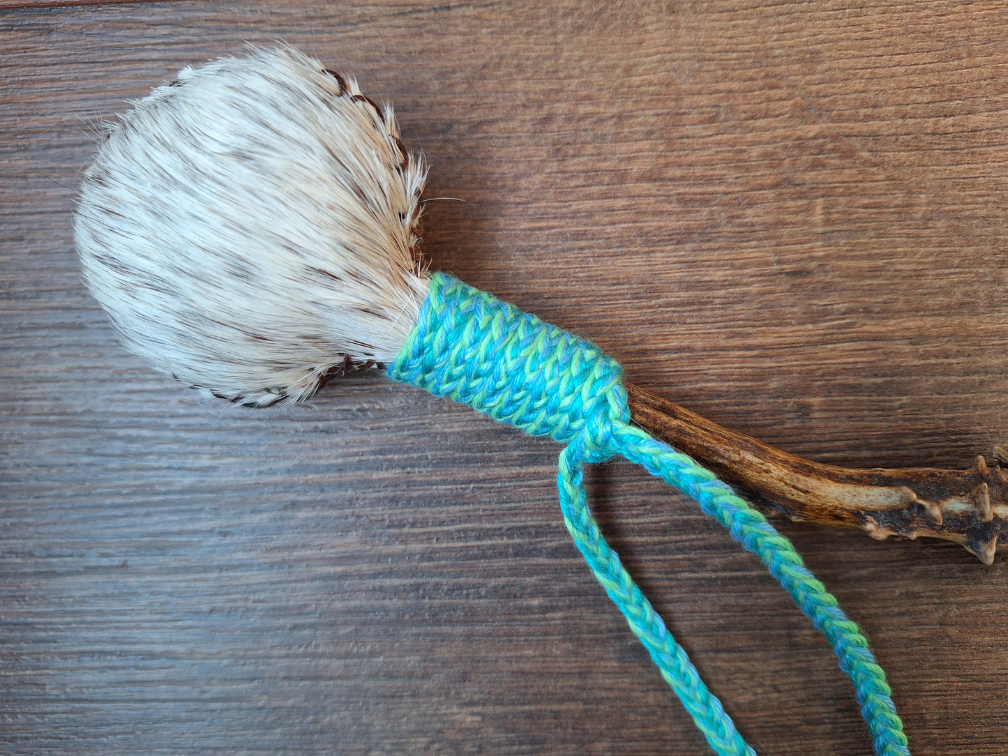 Horse hide and roe deer antler rattle