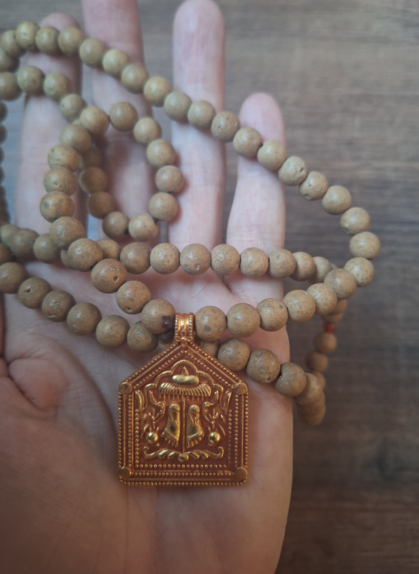 Vintage bodhi seed mala with Feet of the Buddha pendant