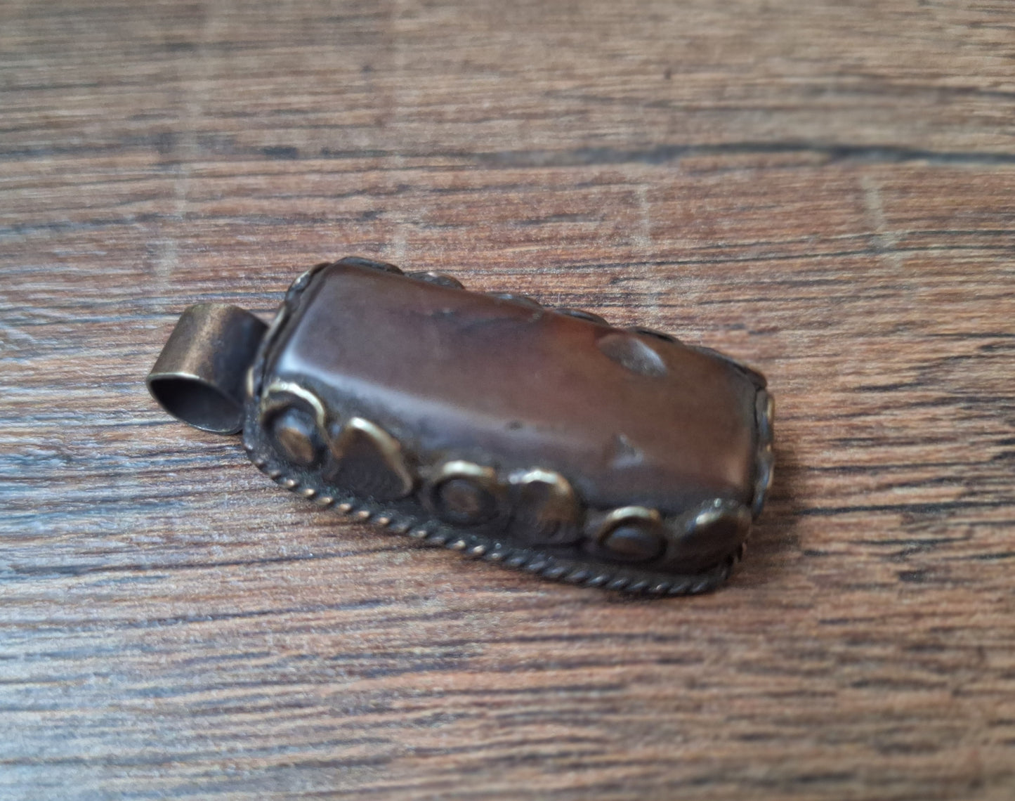 Vintage Tibetan silver and amber pendant