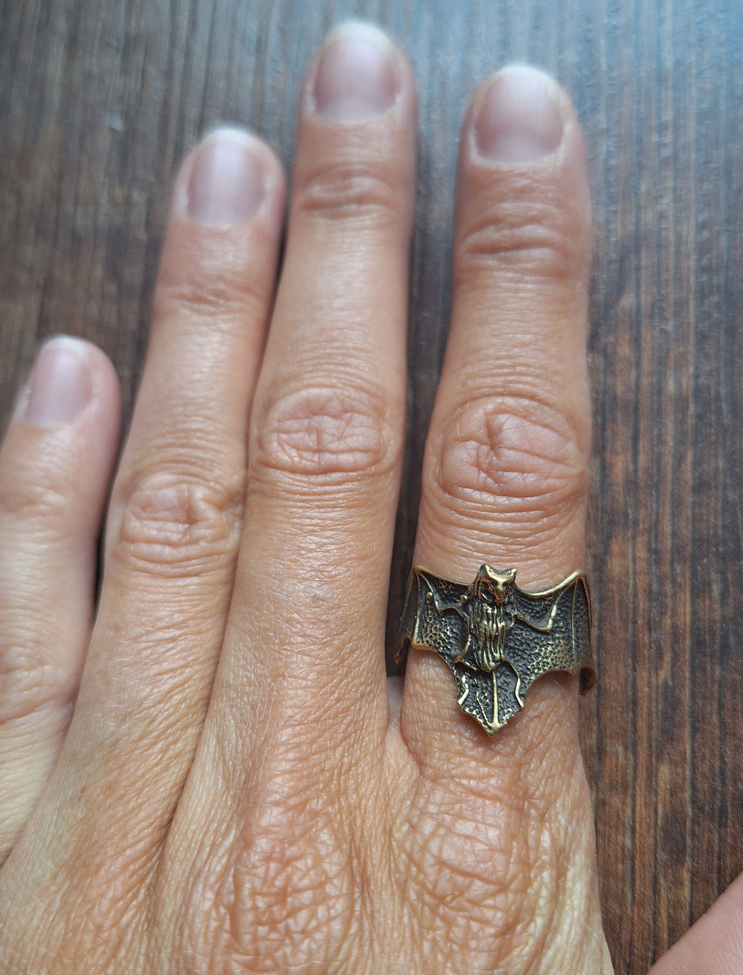 Brass ring Bat