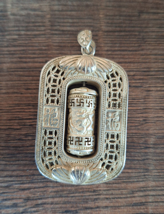 Vintage silver prayer wheel pendant