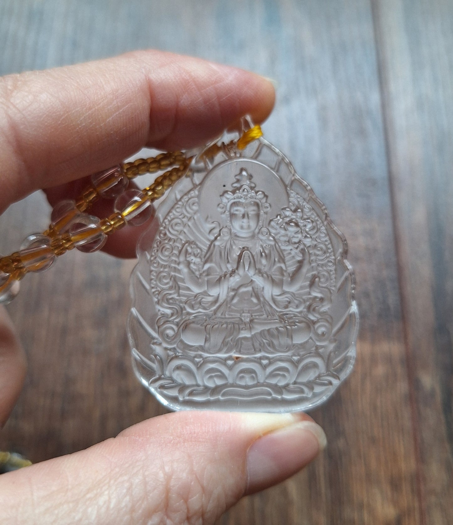 Glass necklace with Guanyin pendant