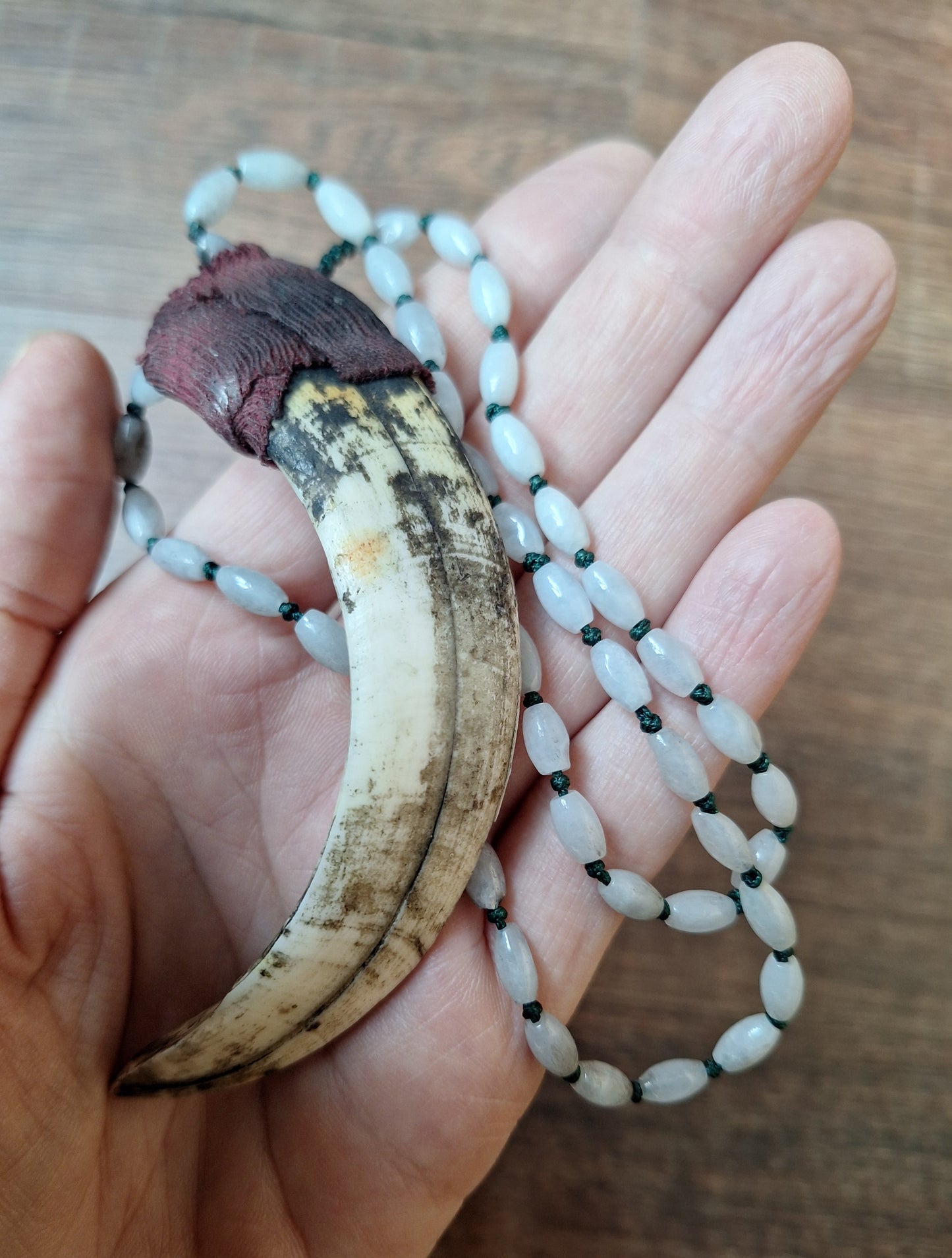 Vintage Nepalese snow quartz necklace with wild boar tooth pendant