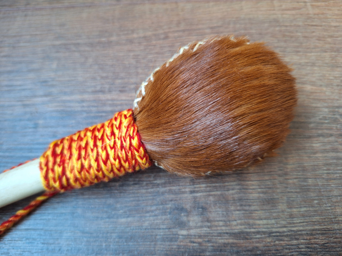 Horse hide and red deer leg bone rattle