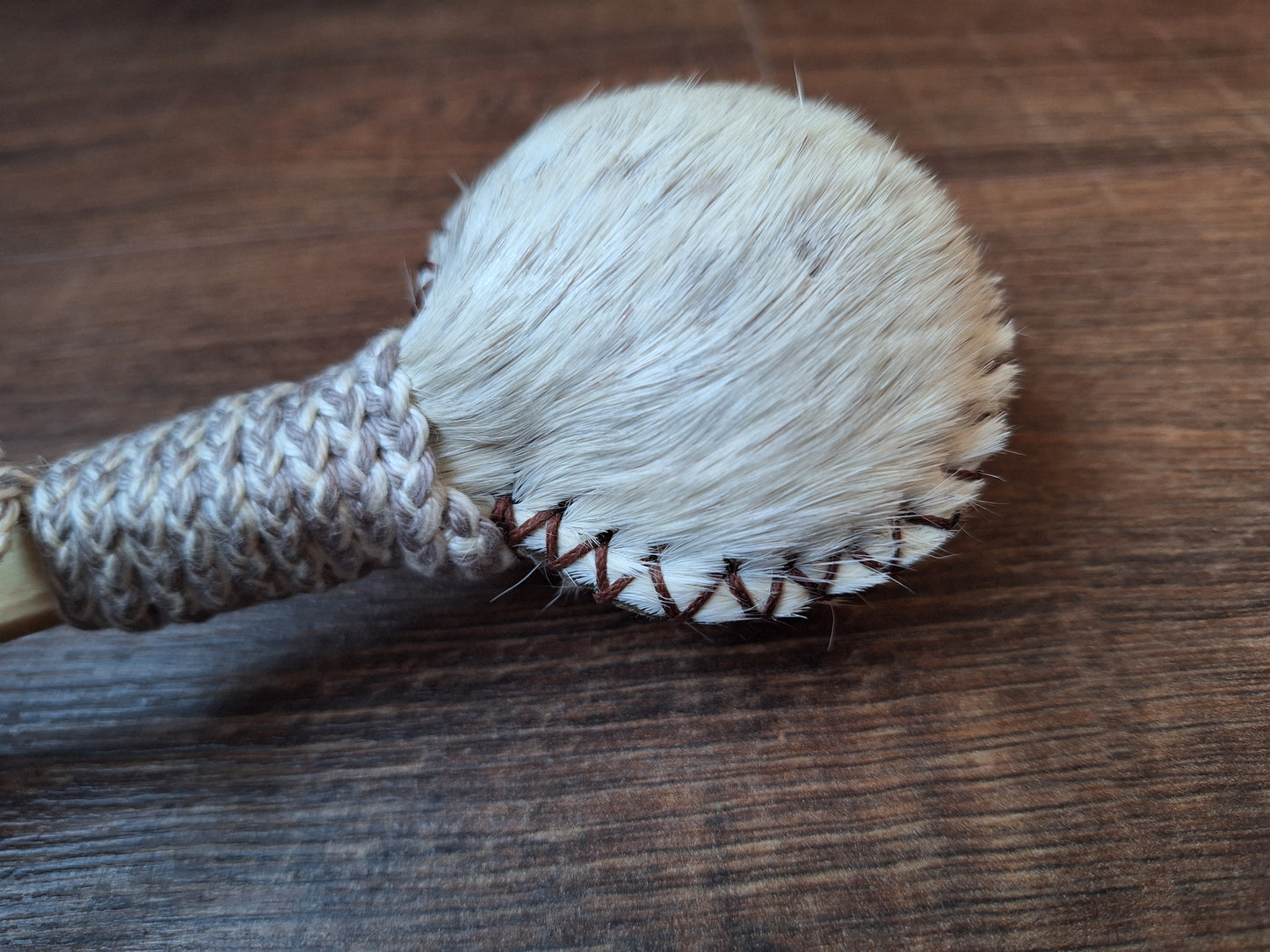 Horse hide and red deer leg bone rattle