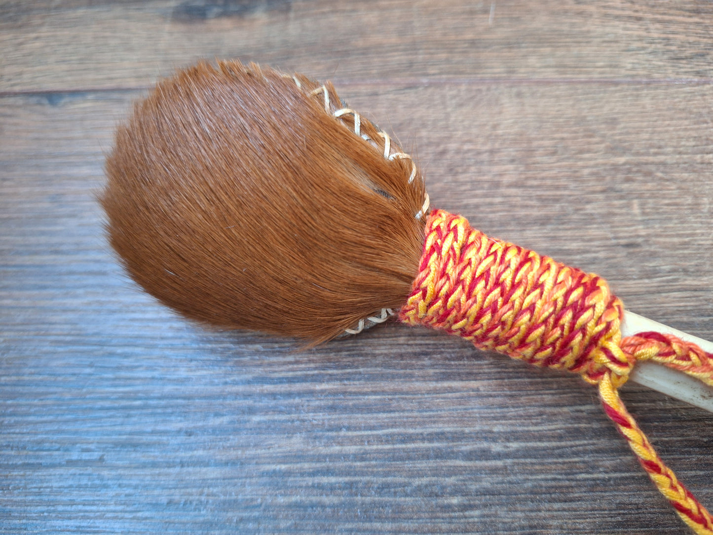 Horse hide and red deer leg bone rattle