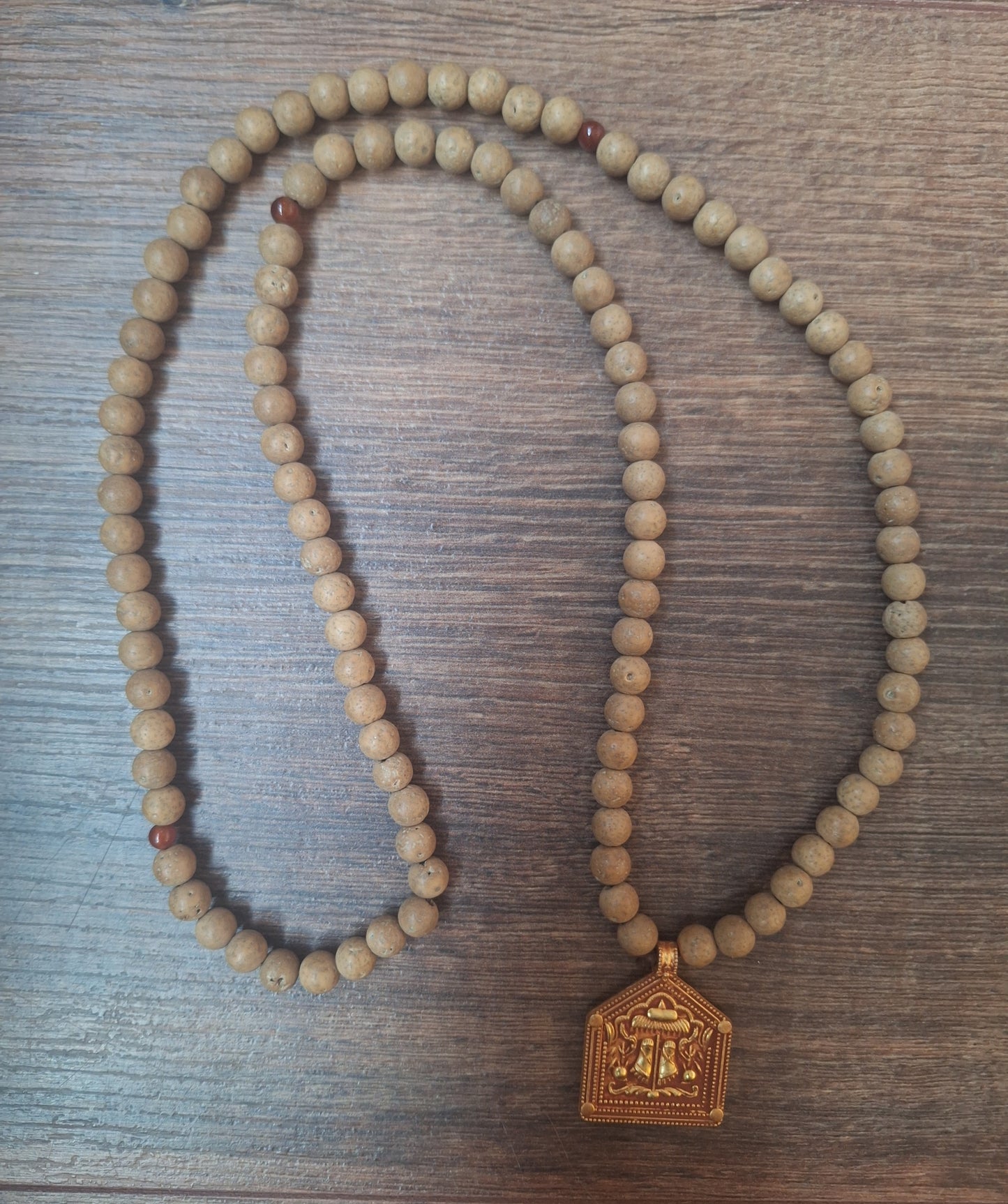 Vintage bodhi seed mala with Feet of the Buddha pendant